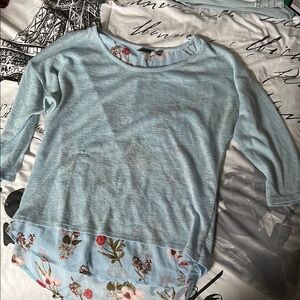 Soho New York and Company Blue Asymmetrical Blouse elbow length.